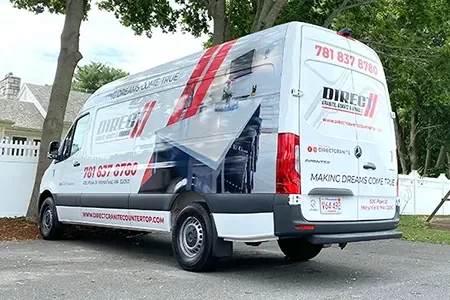 Professional vehicle wrap and lettering for a construction fleet in MA.